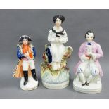 Three Staffordshire pottery figures, tallest 23cm (3)