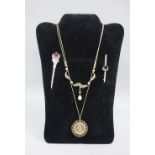 Mixed lot to include a Queen Victoria 1887 shilling coin pendant on a yellow metal chain, gilt metal