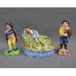 Staffordshire pottery figures to include a Fiddler and two others, tallest 18cm (3)