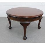 Small circular topped occasional table on cabriole legs with claw and feet, with pull out slides ,