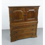 Oak cabinet with a pair of doors over three long drawers, 125 x 108cm