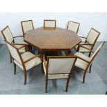 Modern Indonesian rosewood dining table with octagonal top and pedestal base together with a