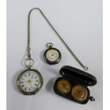 Continental white metal cased fob watch and another smaller and a white metal coin case (3)