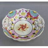 19th century punch bowl with flower pattern, possibly Welsh, with a scalloped rim and circular base,