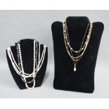 Two 9ct gold chains, 9ct gold chain with pearls, a strand of cultured pearls with a 9ct gold