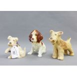 Three Sylvac pottery dogs, tallest 12cm (3)