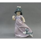 Nao porcelain figure of a girl and her puppy, 17cm high