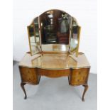 Walnut dressing table on cabriole legs, 155 x 114cm