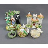 Staffordshire pottery Tithe Pig figure group and a birds nest pen holder and two others and a