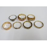 A collection of six 9ct gold rings and another unmarked yellow metal ring (7)