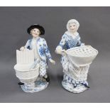 A pair of 19th century porcelain male and female figures, (male figure with losses), with blue cros