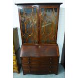 19th century mahogany bureau bookcase cabinet, with a pair of astragal glazed doors over a fall