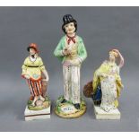 Three Staffordshire pottery figures to include a double sided Water & Gin figure and two small