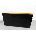 Contemporary sideboard with light wood top over a pair of black high gloss drawers and doors, 81 x