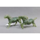 A pair of green jadeite horse figures, longest 11cm (2)