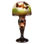 Émile Gallé (French, 1846-1904)A "Butterflies" Table Lamp, France, circa 1910Overlaid and acid-