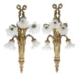 French SchoolA Pair of Louis XVI Style Five-Light Wall Sconces, late 19th/early 20th century Gilt