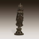 An unusual large Southwest Indian bronze figure of a goddess, probably Bhudevi, Kerala, 16th century