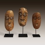 A trio of Lega masks, Democratic Republic of Congo