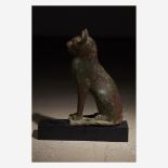 An Egyptian bronze figure of a seated cat, Late Period, circa 664-332 B.C.E.