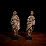 Two French late Gothic polychrome walnut figures of the Virgin Mary and Saint Anne, 16th century