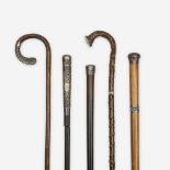 A group of five silver-mounted canes, Various dates 19th/early 20th century