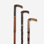 A group of three horn-mounted dagger canes, Various dates late 19th/early 20th century