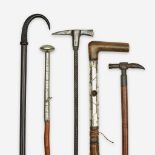 A group of five walking sticks pertaining to hiking, Various dates 19th/20th century