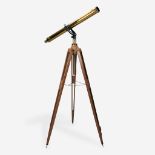 A large brass and iron telescope on oak tripod stand, first half 20th century