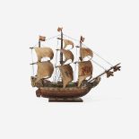 A parcel-gilt and polychromed carved wood model of a Spanish galleon, probably 19th century
