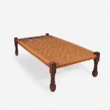 An Indian teak daybed with rope seat, 19th century