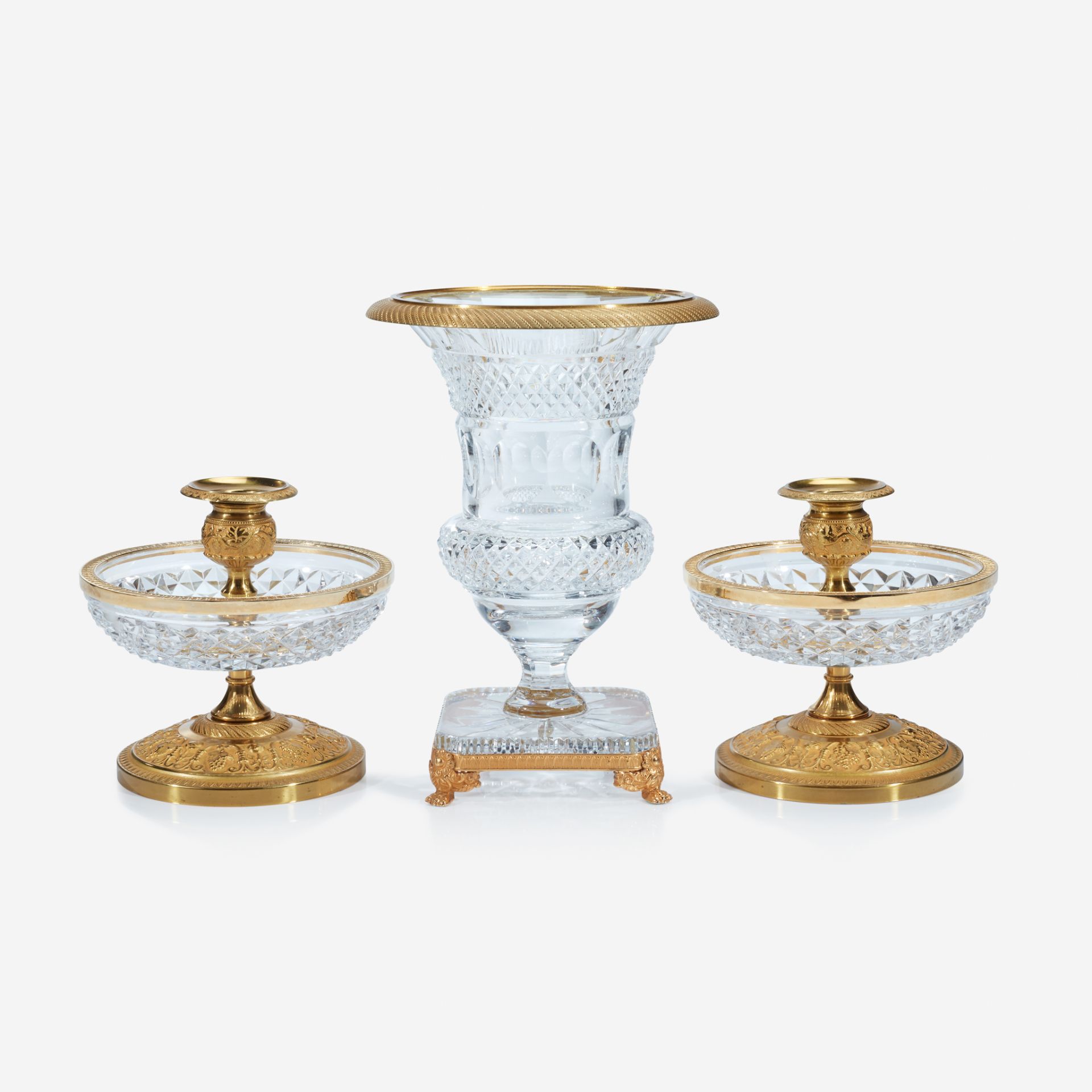 An assembled Charles X style gilt-metal and moulded glass three-piece vase garniture, 20th century