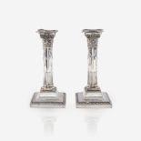 A pair of Edward VII weighted sterling silver candlesticks, David David & Maurice David, Sheffield,