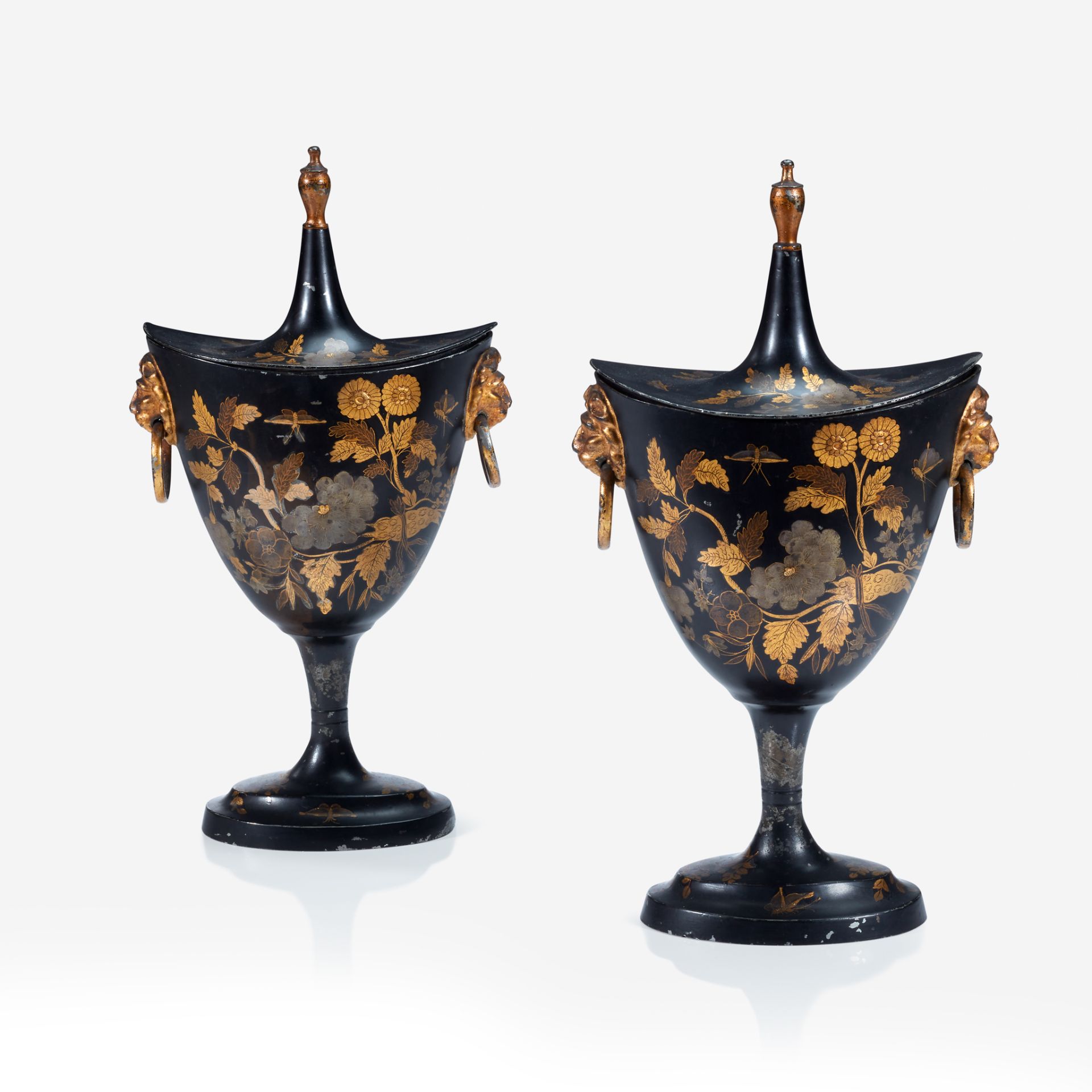 A pair of George III japanned tôle peinte chestnut urns, Late 18th/early 19th century