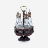A William IV/Victorian silver mounted cruet set with brass-mounted mahogany stand, Maker's mark TC p