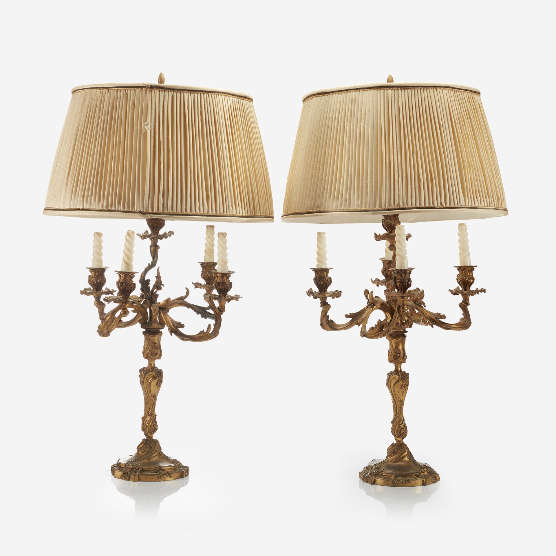 A pair of Louis XV style gilt-bronze candelabra, Late 19th century