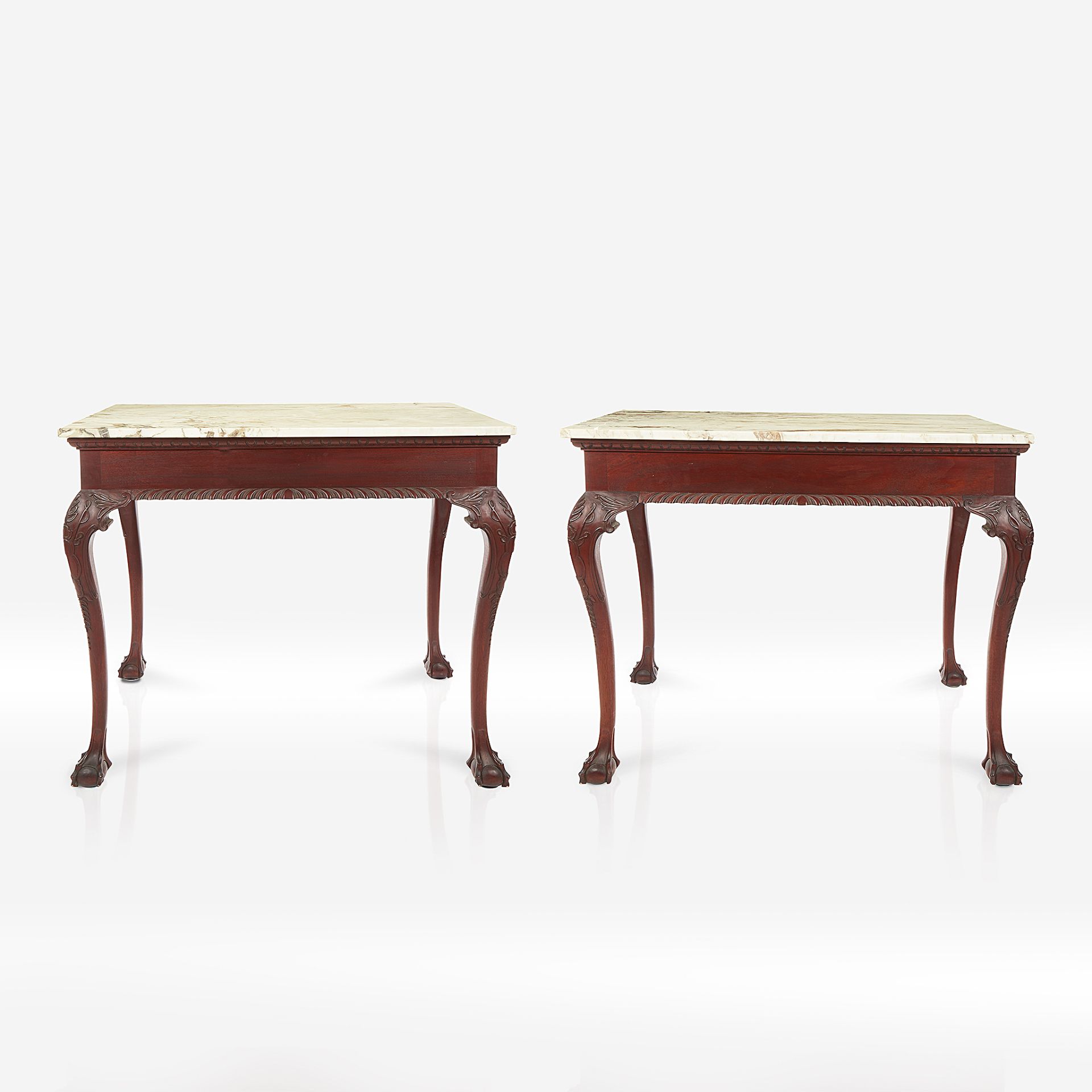 A pair of George II style marble-topped mahogany consoles with Calcatta gold marble tops, 20th centu