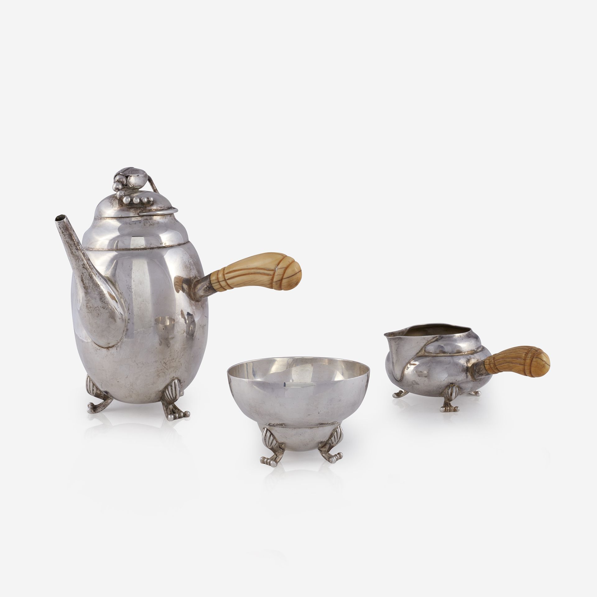 An American sterling silver three-piece tea service, Unknown maker, 20th century