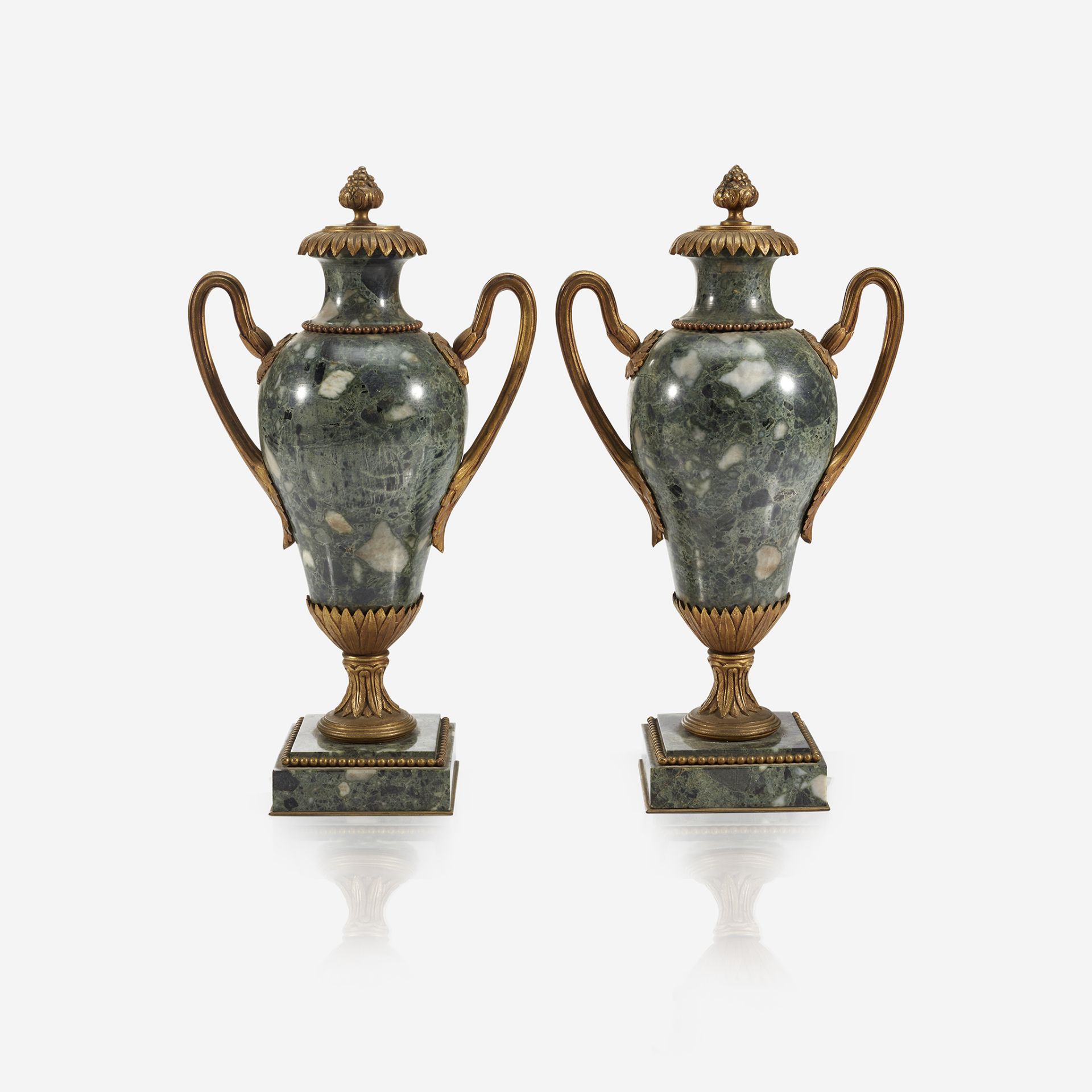 A pair of Louis XVI style gilt-bronze mounted specimen marble vases, Late 19th/early 20th century