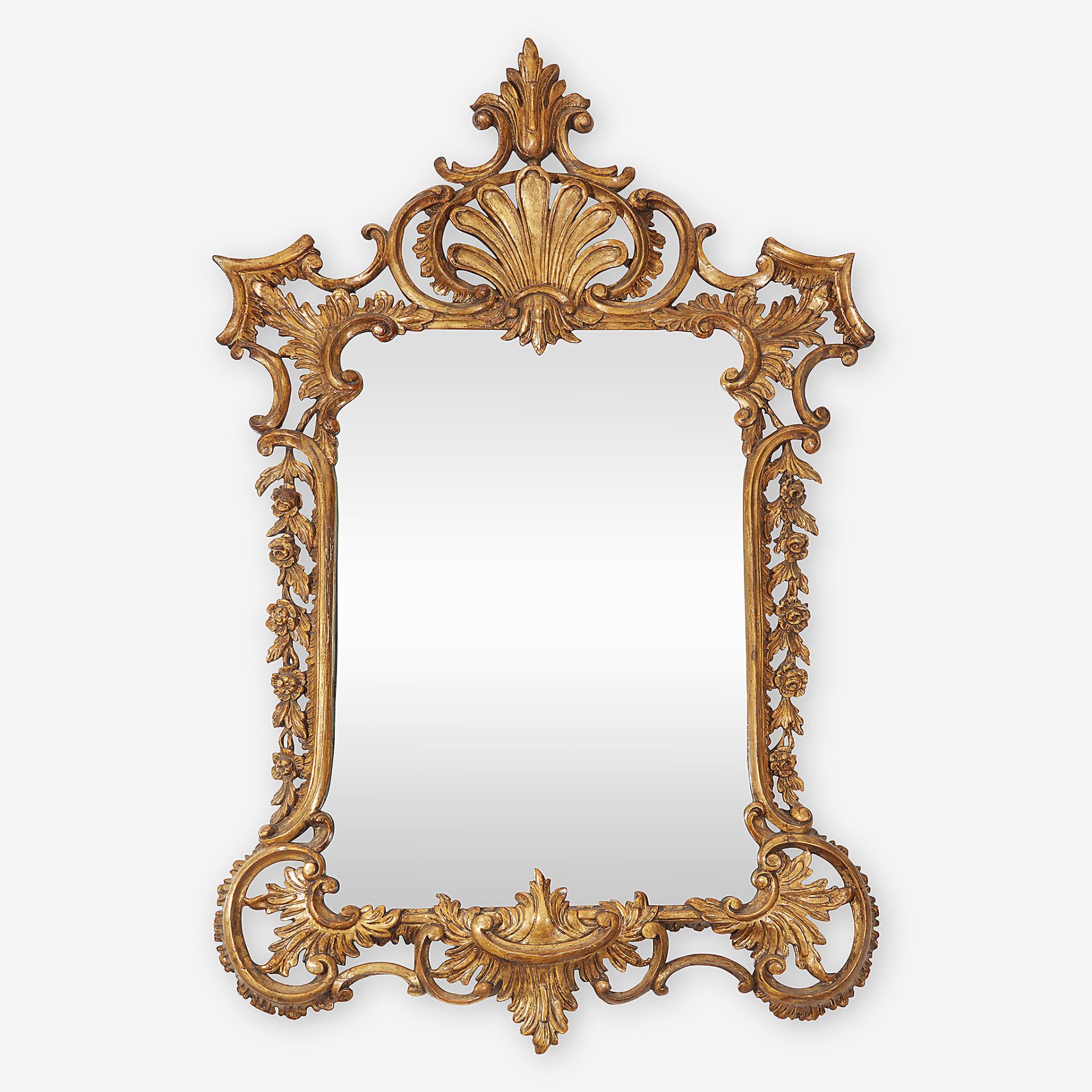 A Continental Rococo carved pine giltwood mirror, Probably German, 18th century
