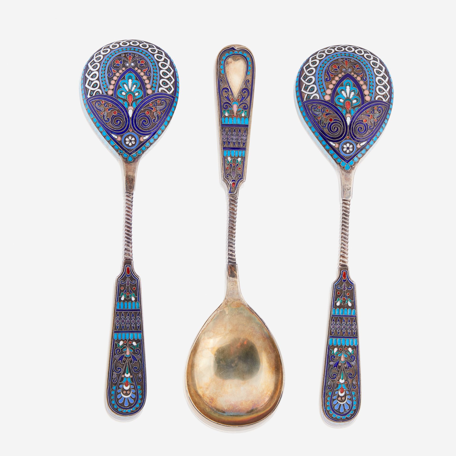 Three large Russian silver-gilt and cloisonné enamel spoons, Pavel Ovchinnikov, August Hollming, and