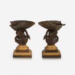 A pair of Charles X gilt and patinated bronze swan-form vide-poches, First quarter 19th century