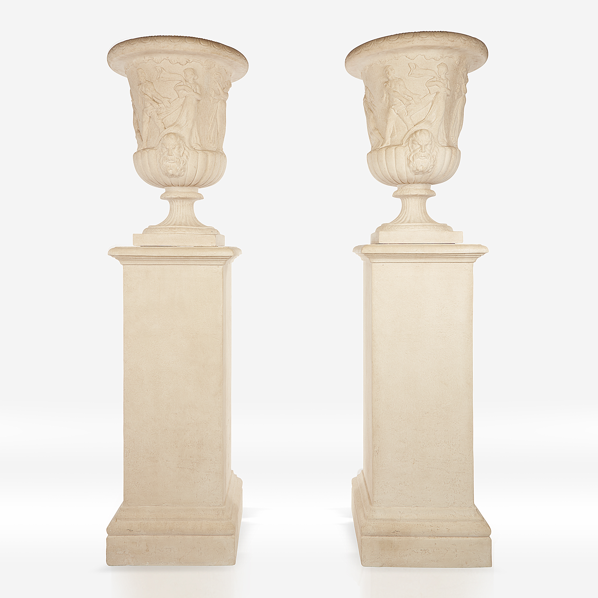A pair of cast stone campana urns on pedestals, 20th century