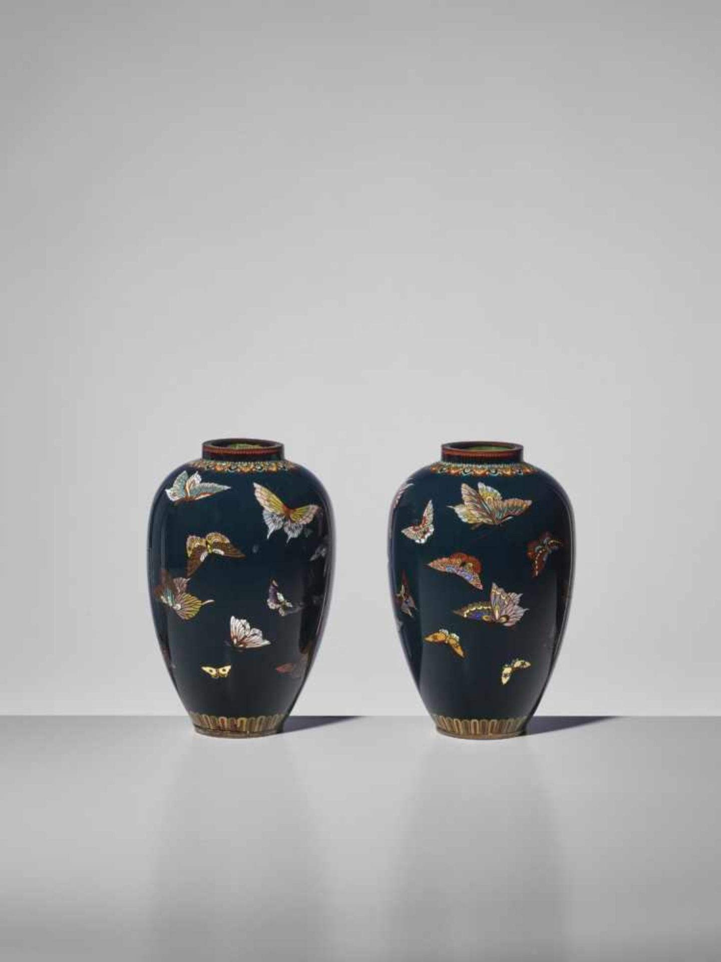 A PAIR OF CLOISONNE ENAMEL VASES WITH BUTTERFLIES