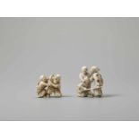 TWO IVORY NETSUKE OF BLIND MEN FIGHTING