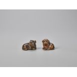 TWO WOOD NETSUKE OF A RAT AND A DOG