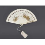 A FINE LACQUERED IVORY FAN