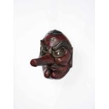 A LACQUERED TENGU CEREMONIAL MASK