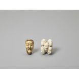 TWO IVORY NETSUKE OF MASKS