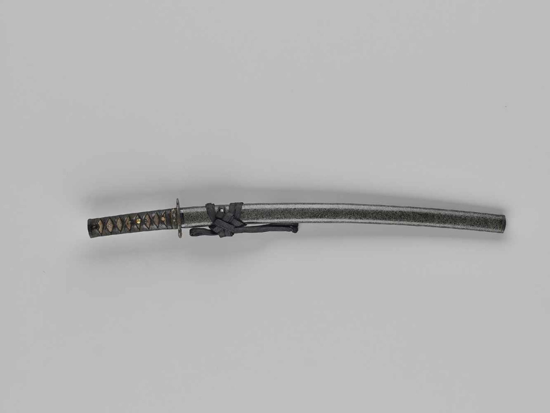 NORIMITSU: A WAKIZASHI WITH HORIMONO IN KOSHIRAE